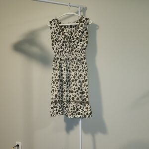 Elegant Sleeveless Polka Dot Midi Dress